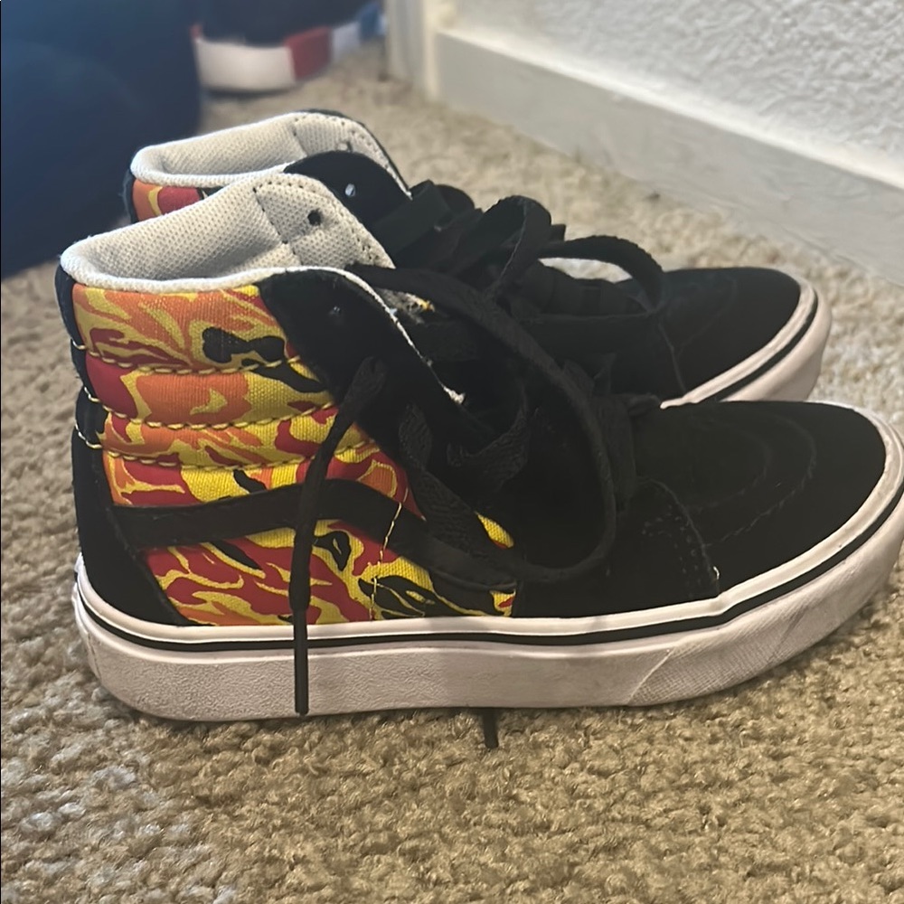 Vans Black and White High-Top Sneakers